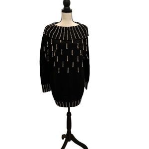 Ladies size medium black festive beaded sweater.